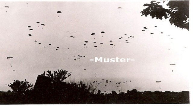 Parachutes falling from the sky in Crete, May 20, 1941.